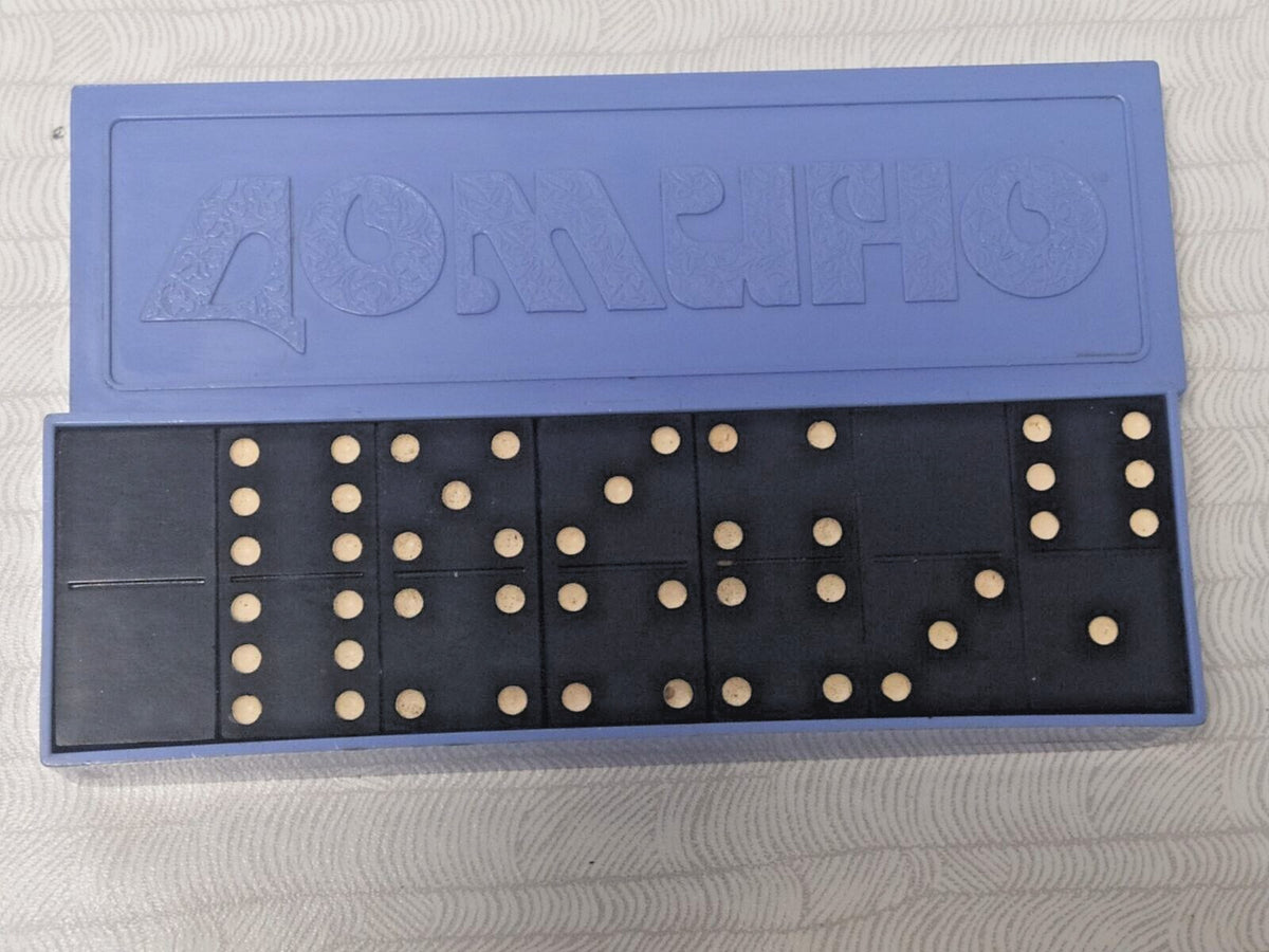 Soviet domino set with black tiles and blue plastic case engraved DOMINO