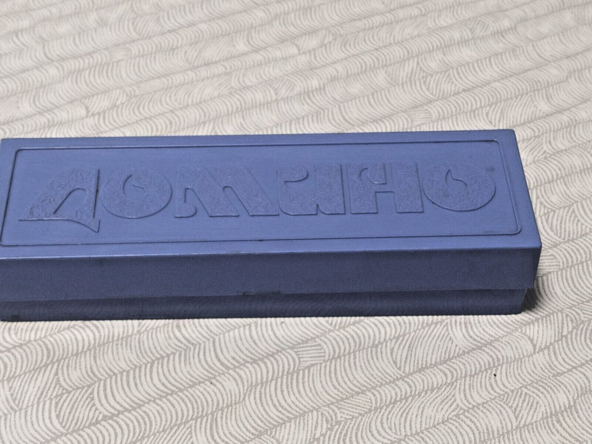 Bottom of Soviet domino case with factory stamps and price in rubles – detail 10