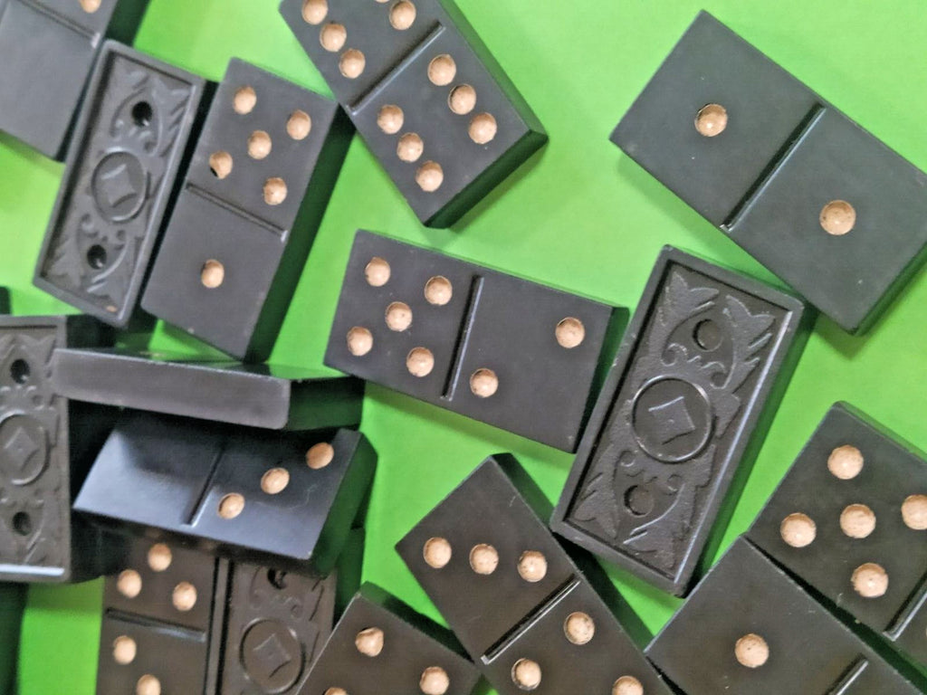 Black carbolite domino tiles with cream dots and embossed rhombus pattern on the back – detail 11