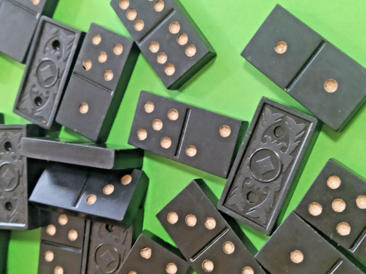 Black carbolite domino tiles with cream dots and embossed rhombus pattern on the back – detail 11