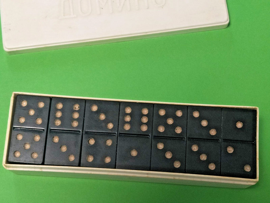 Black carbolite domino tiles with cream dots and embossed rhombus pattern on the back – detail 5