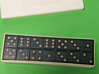 Black carbolite domino tiles with cream dots and embossed rhombus pattern on the back – detail 5