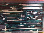 Soviet drawing instruments: compasses, rulers and extensions in their slots – detail 11