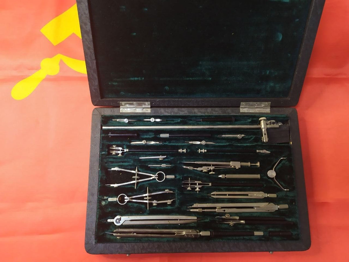 Soviet drawing instruments: compasses, rulers and extensions in their slots