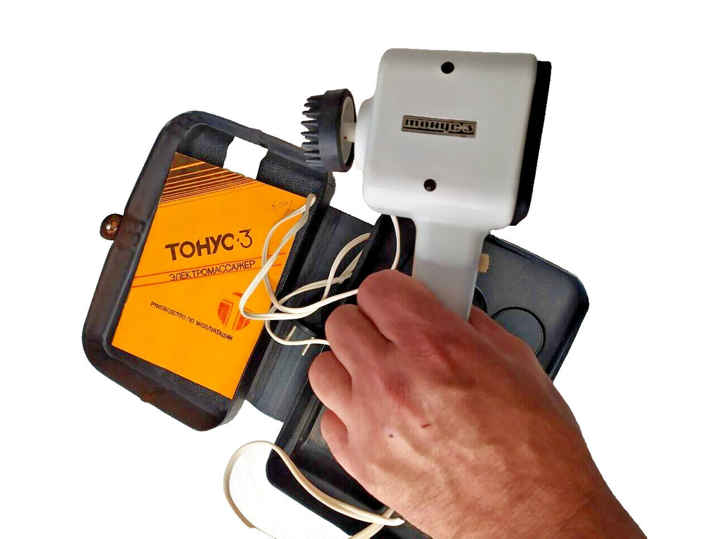 Tonus-3 handheld massager with pistol grip and two-speed switch