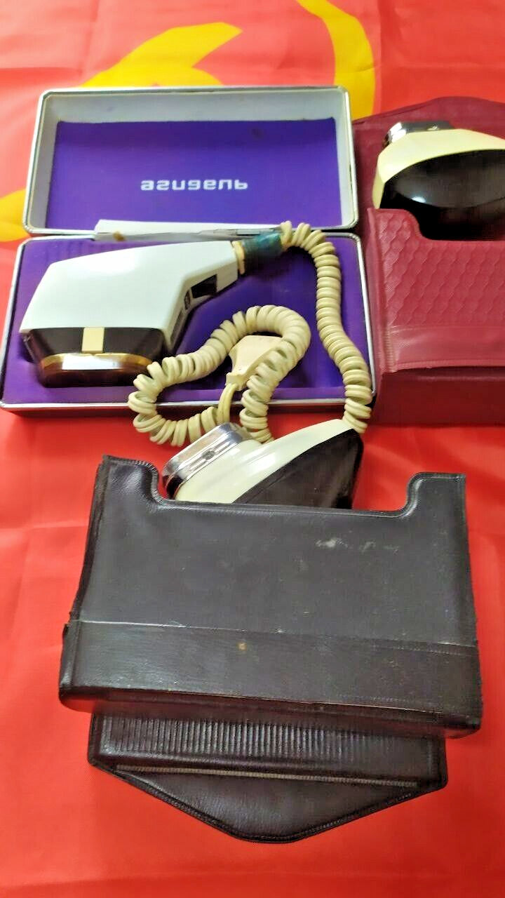 Group of five Soviet shavers with hard shell and soft vinyl travel cases