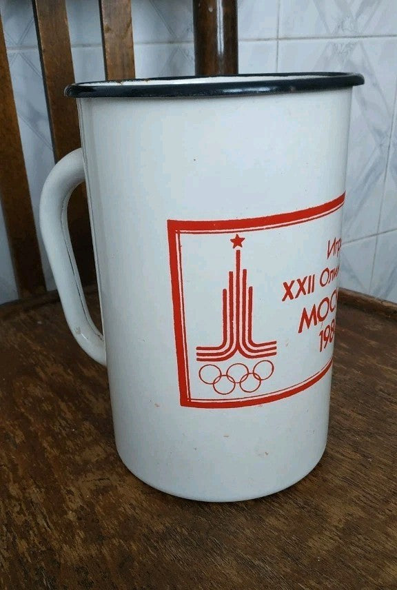 Soviet enamel mug with red Moscow 1980 Olympics emblem and sports pictograms