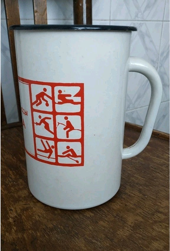 Soviet enamelware mug with cycling, basketball and rowing pictograms