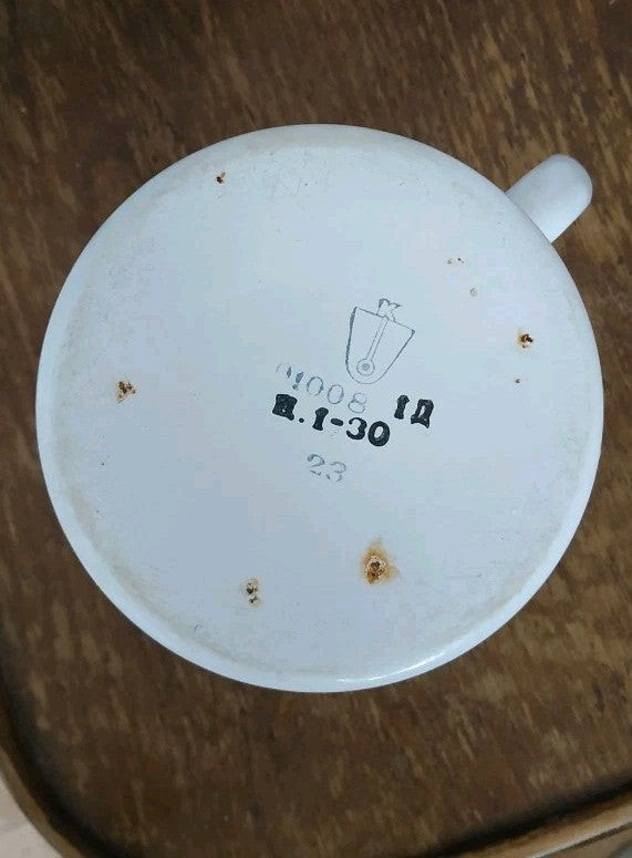 White Olympic souvenir mug with black rim made in the USSR