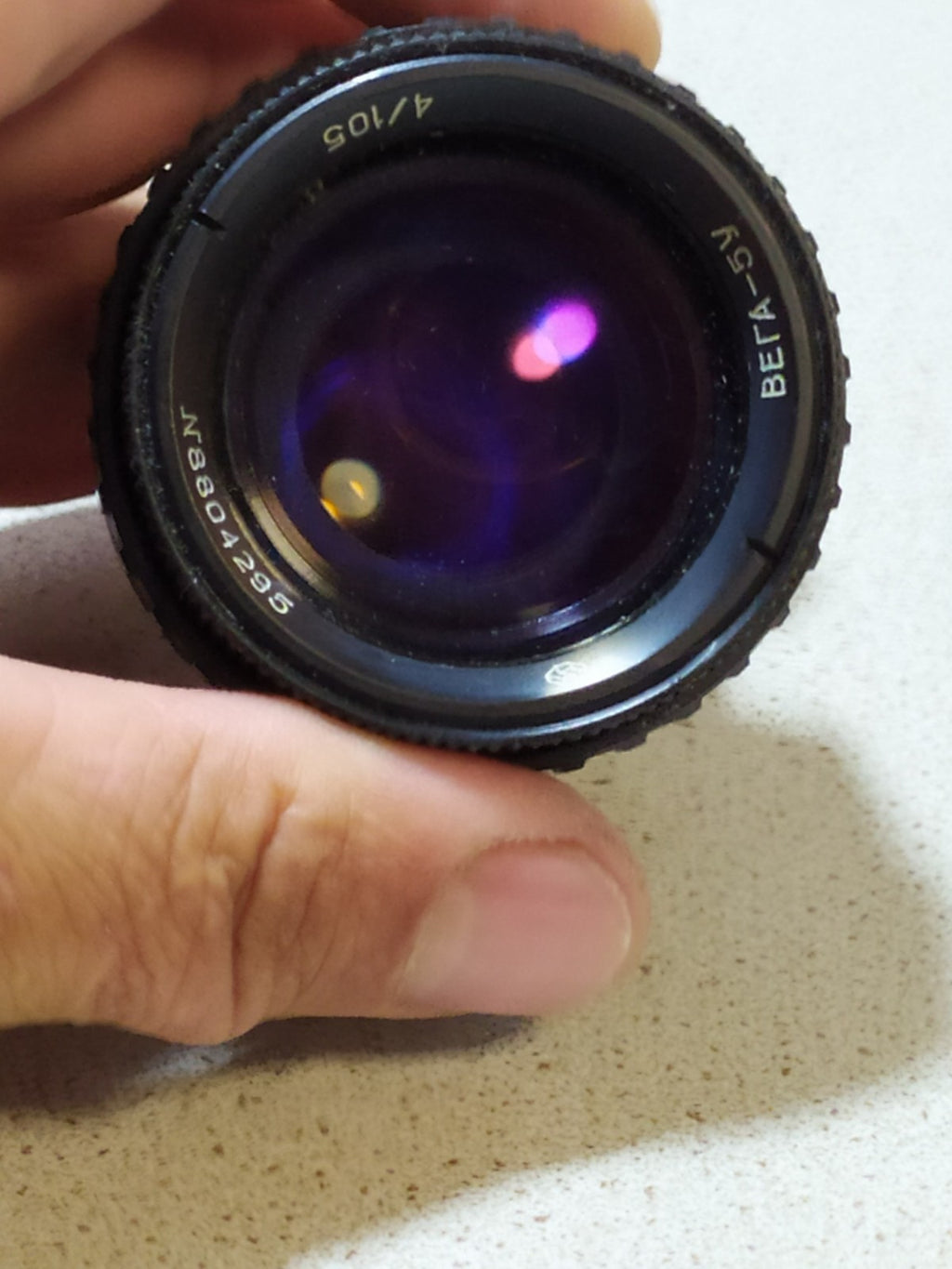 Vega-5U 4/105 lens front element with purple coating
