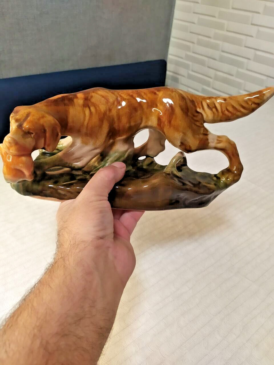 Konakovo faience setter figurine in multi-toned brown glaze, side view