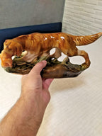 Konakovo faience setter figurine in multi-toned brown glaze, side view