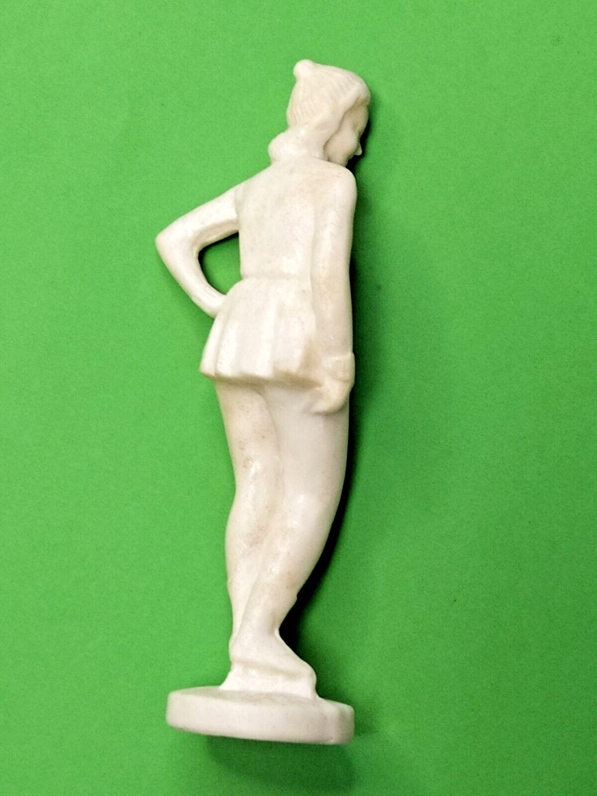 Soviet plastic figurine surface texture close-up – detail 7