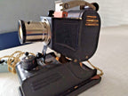 Filmstrip projector lens marked Glavuchtekhprom Plant No. 6, F=7.7 cm