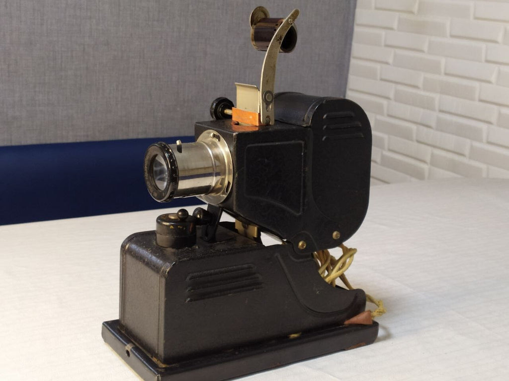 Vintage slide projector from the 1950s USSR with lamp lit during testing – detail 8