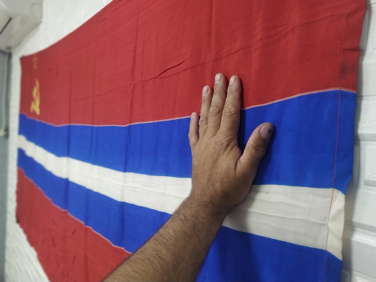 Close-up of small holes and wear on the original Armenian SSR flag – detail 7