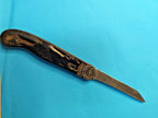 Belka folding pocket knife handle with raised squirrel image on both sides
