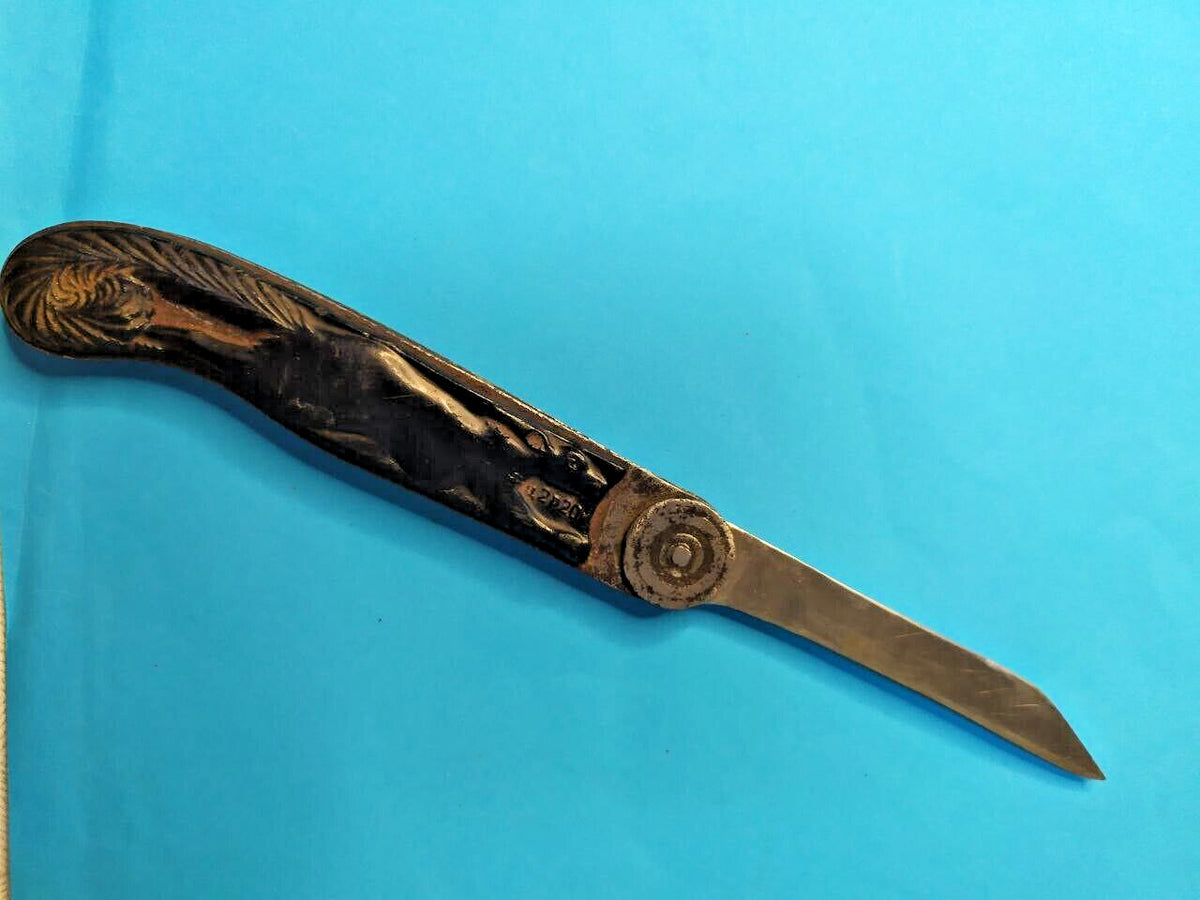 Belka folding pocket knife handle with raised squirrel image on both sides