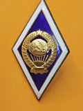 Soviet graduation badge rhombus with blue enamel center and gilded State Emblem