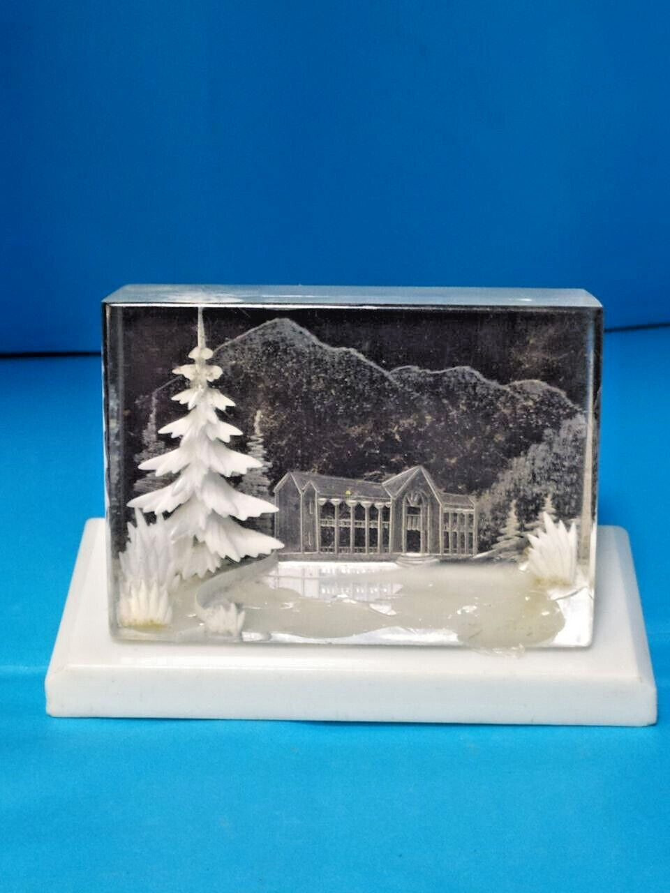 Soviet home decor reverse carved Lucite diorama with a winter landscape and mountain house