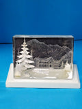 Soviet home decor reverse carved Lucite diorama with a winter landscape and mountain house