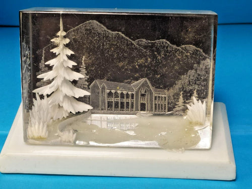 Reverse carved lucite diorama snow-covered fir tree and frozen lake