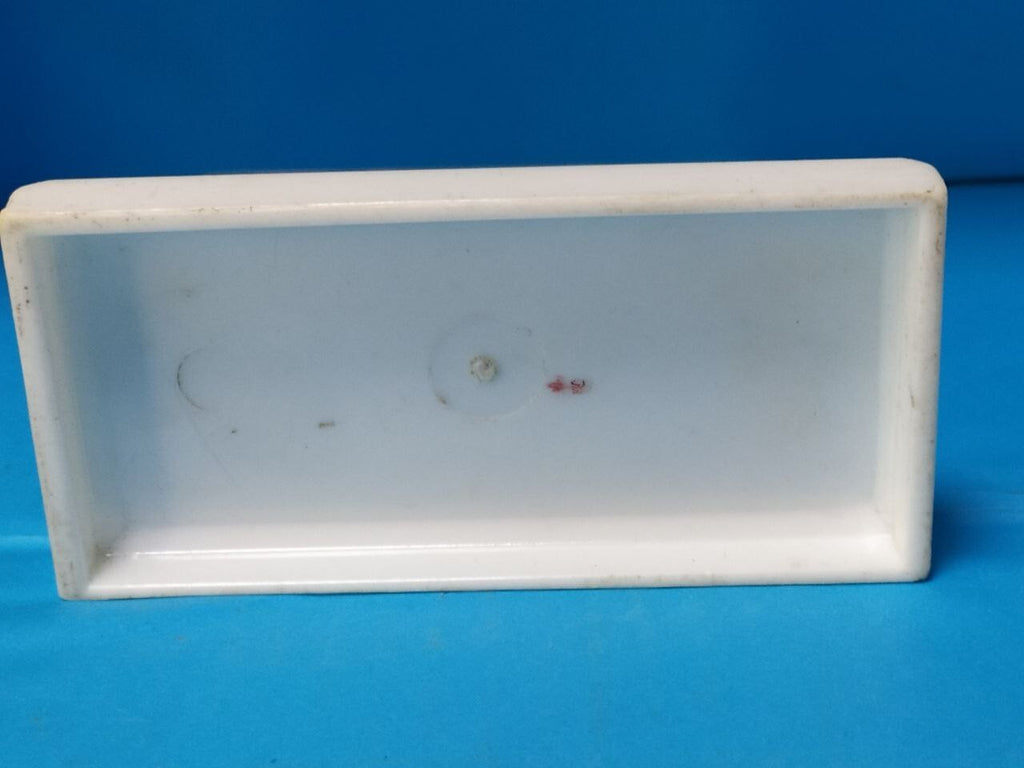 Soviet plexiglass souvenir on white rectangular base, side view – detail 6