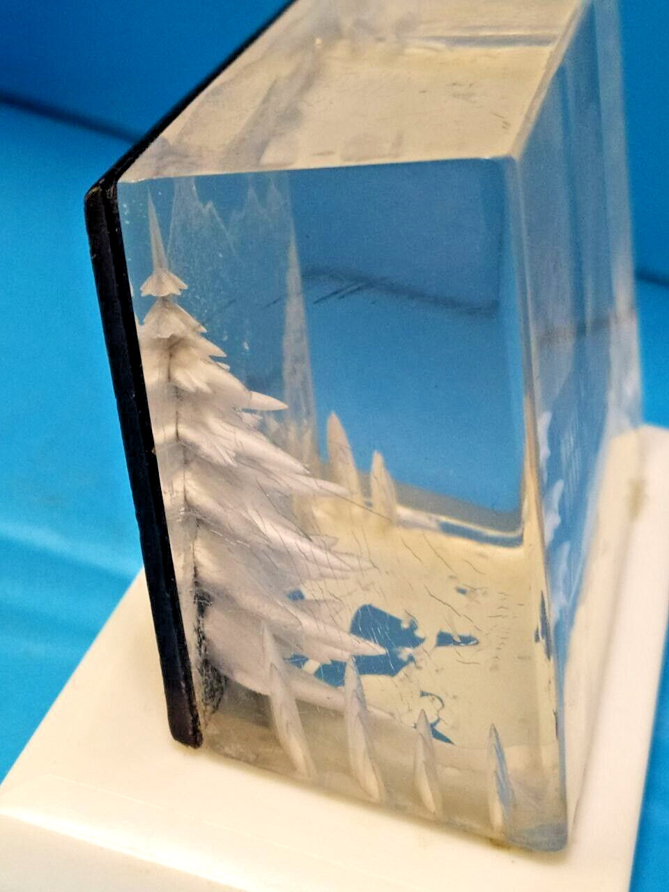 Soviet plexiglass souvenir on white rectangular base, side view – detail 9