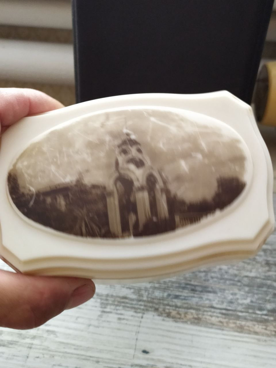 Bottom of the Sochi souvenir box with molded Soviet factory logo