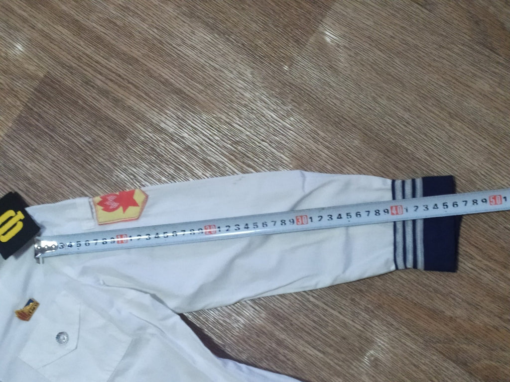 Soviet kids sailor uniform pieces laid out together – detail 10
