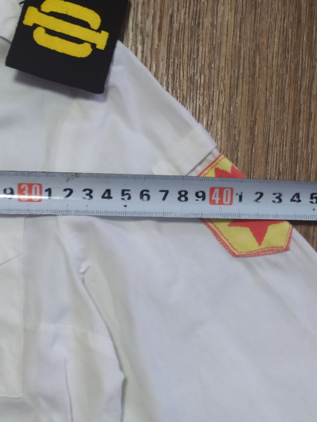 Soviet kids sailor uniform pieces laid out together – detail 13