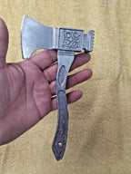 Cast handle with stylized kremlin wall relief