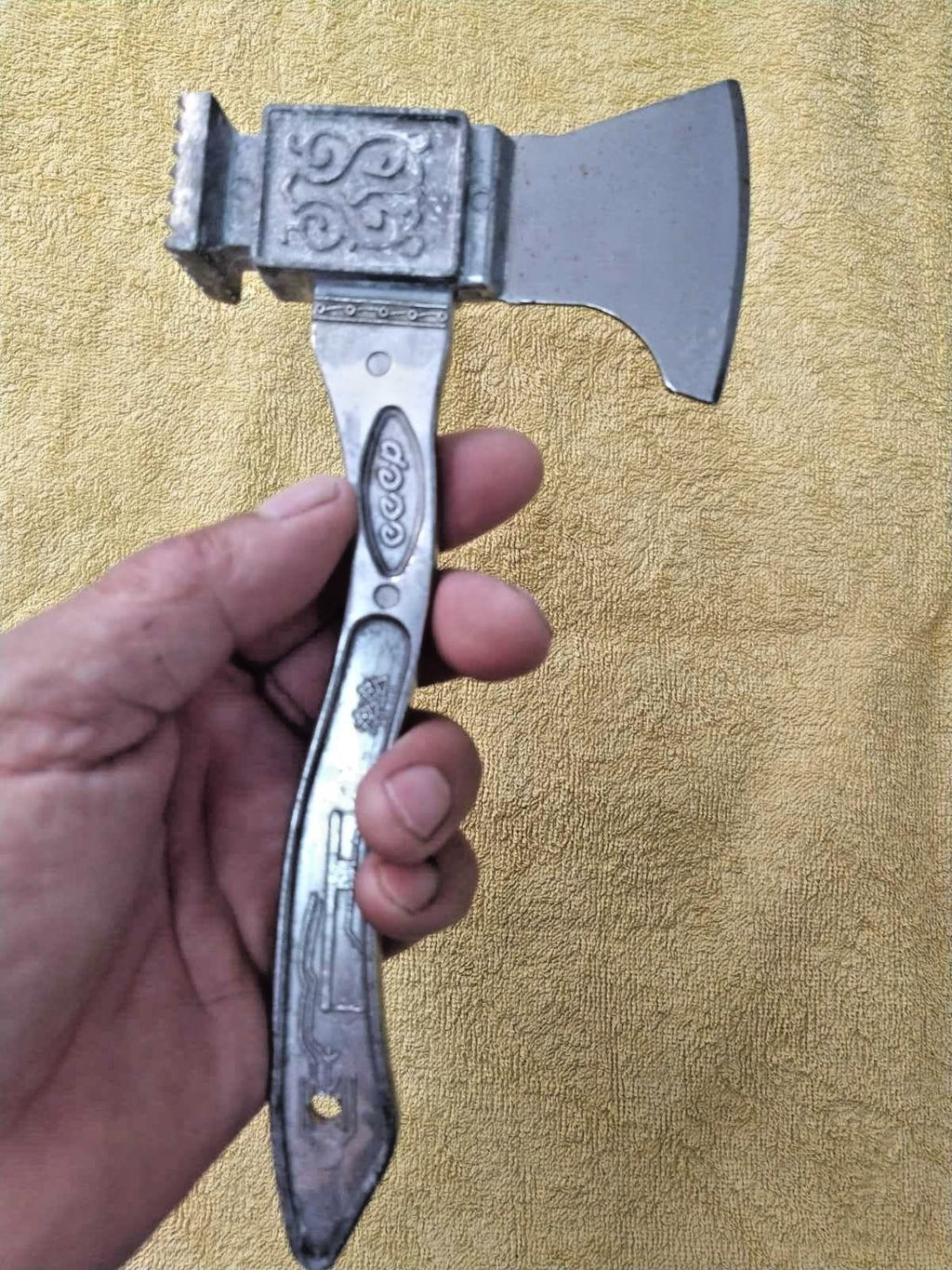 Soviet kitchen tool with Slavic ornamental patterns
