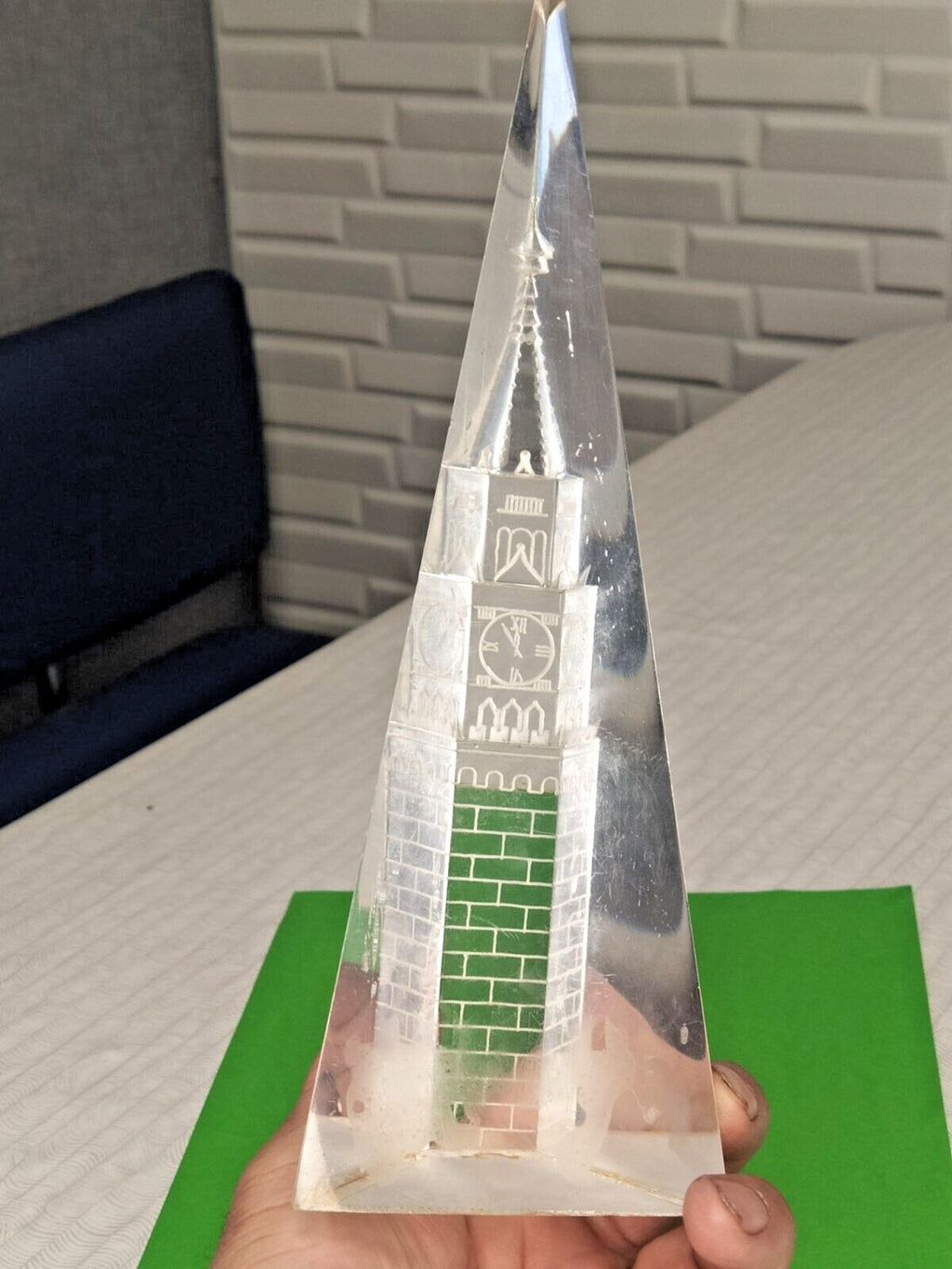 Clear acrylic pyramid souvenir with Moscow Kremlin tower engraved inside