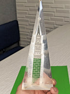 Clear acrylic pyramid souvenir with Moscow Kremlin tower engraved inside