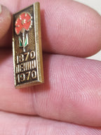 Lenin 100th anniversary pin with a red carnation