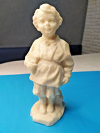 Soviet Lenin figurine of young Volodya Ulyanov holding a book