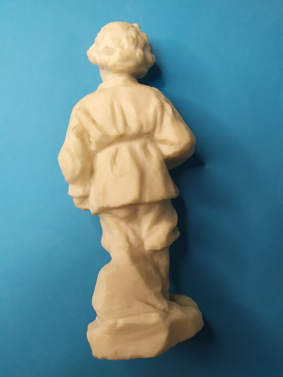 Soviet statue figurine with matte bone-like plastic texture
