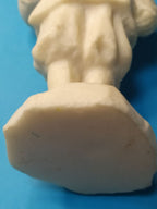 Young Lenin figurine shown next to a measuring tape – detail 7