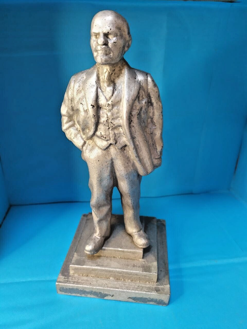 Soviet Lenin statue in metal alloy standing on a tiered pedestal