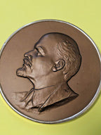 Back of Soviet plaque with original metal mounting bracket and stamp