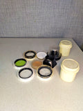 Soviet lens filter set with ZhS-14 52x0.75 yellow filter, lens hoods and adapters