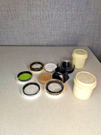 Soviet lens filter set with ZhS-14 52x0.75 yellow filter, lens hoods and adapters