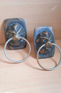 Pair of Soviet lion head door knocker handles in cast bronze/brass with rings