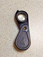Scratches from use on the glass and case of the Soviet optic – detail 10