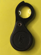 Back of the 7x loupe marked ПЛАСТМАССОВАЯ and price 1 ruble 50 kopecks – detail 6