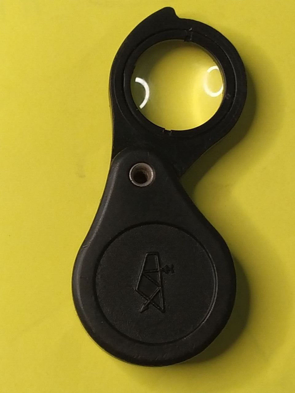 Back of the 7x loupe marked ПЛАСТМАССОВАЯ and price 1 ruble 50 kopecks – detail 6