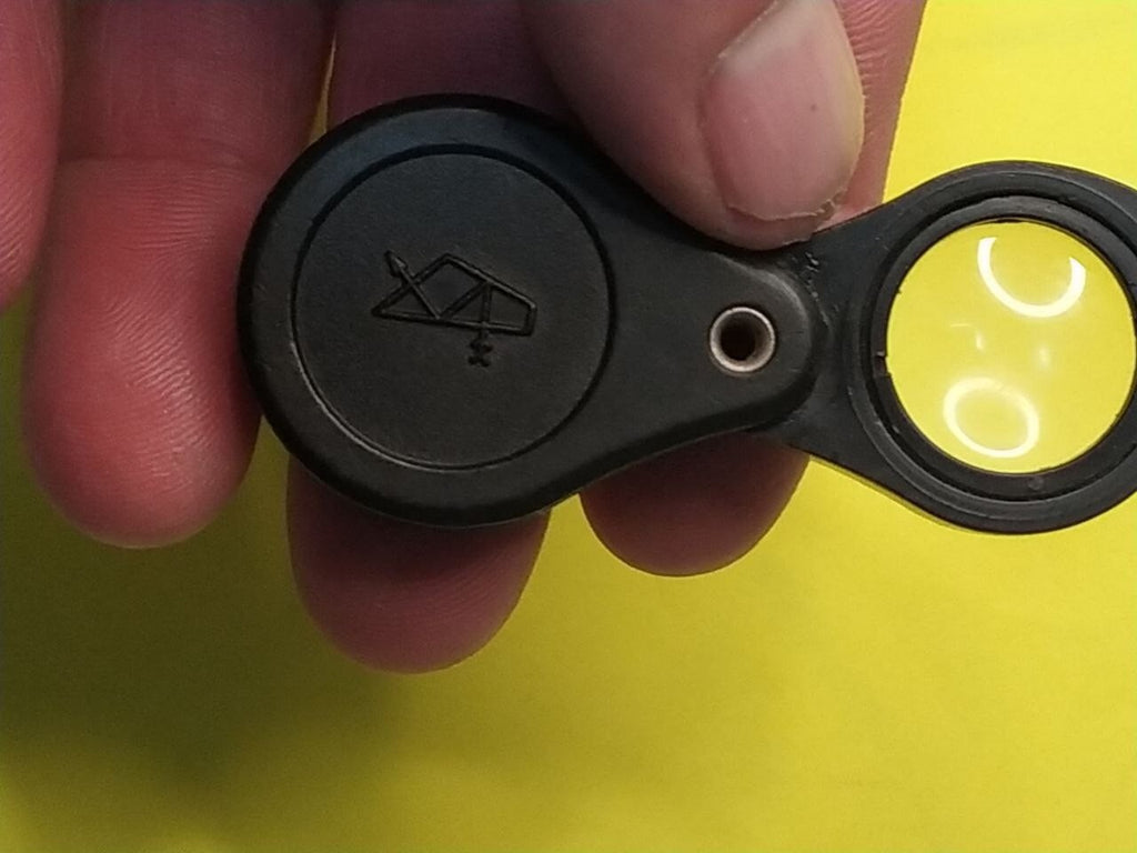 Back of the 7x loupe marked ПЛАСТМАССОВАЯ and price 1 ruble 50 kopecks – detail 9