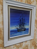 Soviet vintage art: tall ship under full sail on indigo night sea