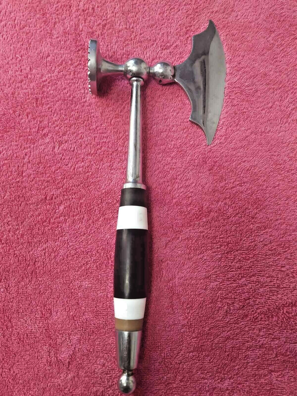 Vintage 2-in-1 kitchen tool with textured hammer face